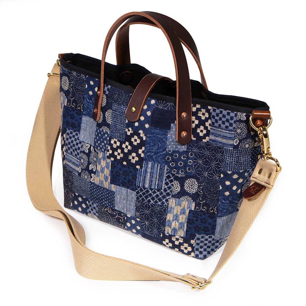 shoulder strap japanese navy patchwork mini tote with brown leather handles