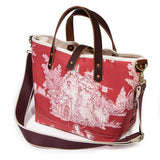 Shoulder strap red toile mini tote with brown leather handles