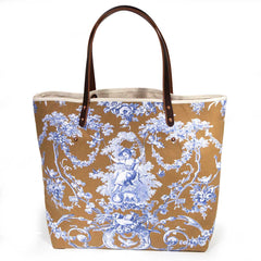 tote with oak and ink blue toile print with brown leather handles and natural canvas body