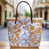 Lifestyle tote with oak and ink blue toile print with brown leather handles and natural canvas body