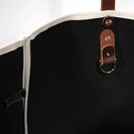 Interior Emerald green toile print canvas tote with natural canvas top and brown leather handles