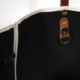 Interior Emerald green toile print canvas tote with natural canvas top and brown leather handles