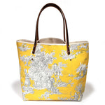 Yellow and black toile tote with brown leather handles