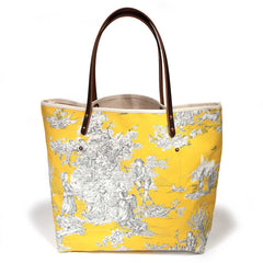 Yellow and black toile tote with brown leather handles