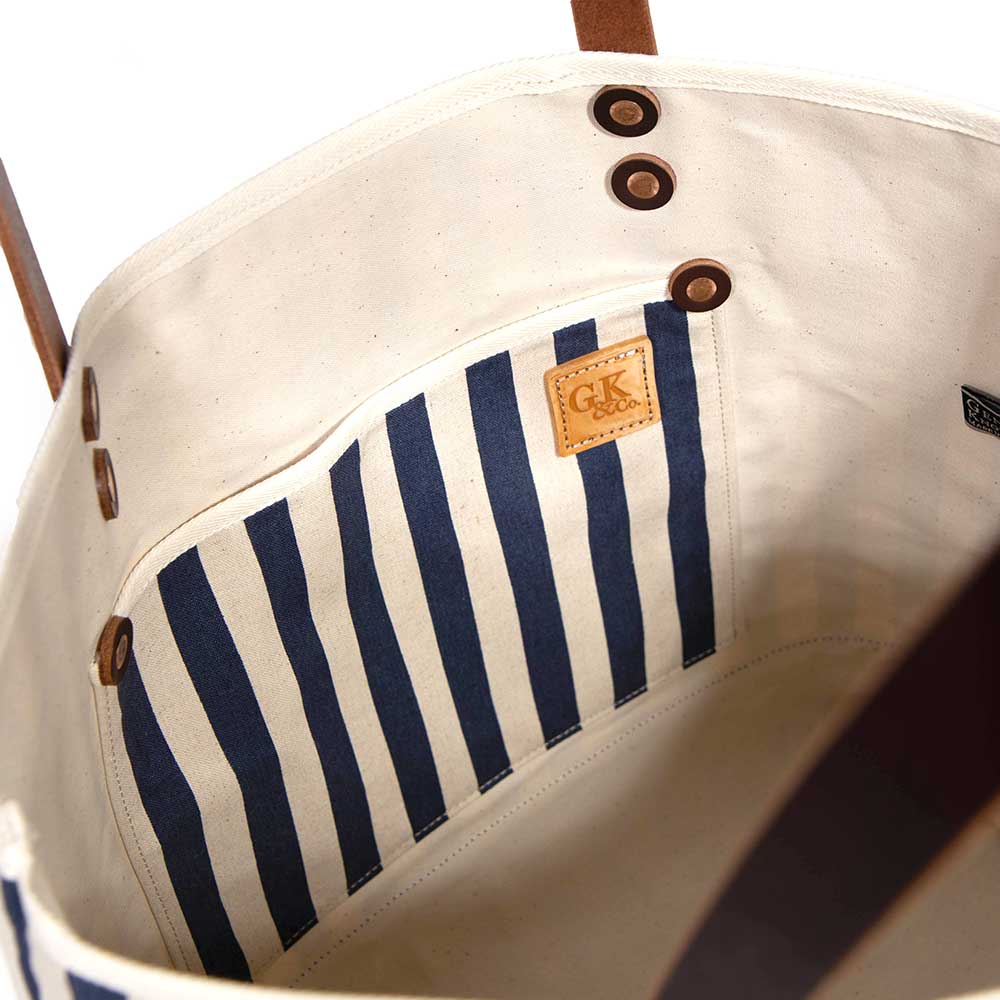 Interior Navy and white stripe canvas tote with blue bottom and brown leather handles