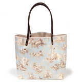 pale blue toile fabric tote bag with dark mahogany leather handles