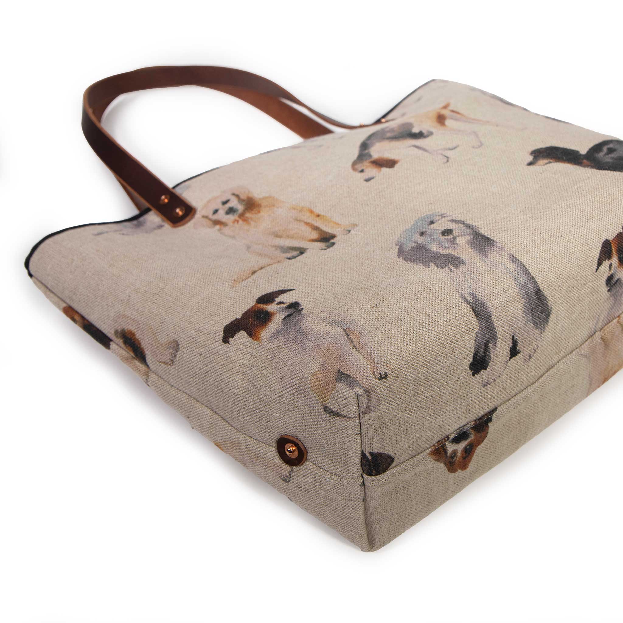 Dog Park All Day Tote resting on its side, showing the base and corner rivet