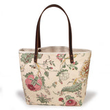 Botanique All Day Tote, front view — cream canvas with pink and gold botanical print, mahogany leather handles