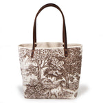 Country Horse All Day Tote, front view — brown toile of horses and trees on cream, mahogany leather handles
