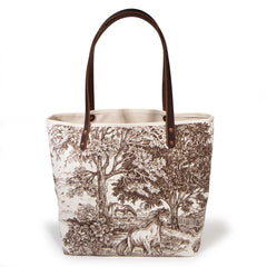 Country Horse All Day Tote, front view — brown toile of horses and trees on cream, mahogany leather handles