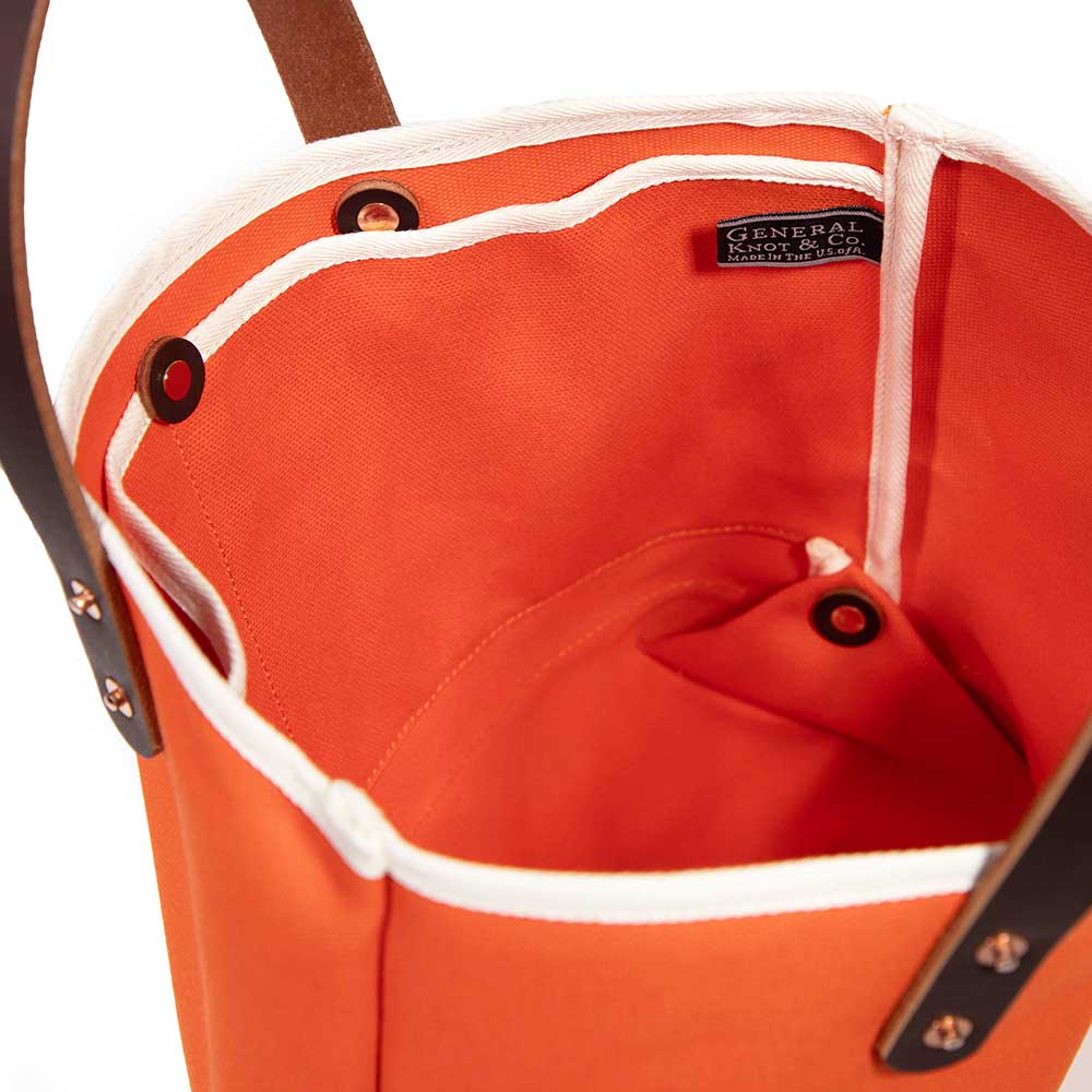 interior flame orange waxed canvas mini tote with brown leather handles