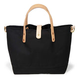 black waxed canvas mini tote with blonde leather handles