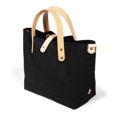 black waxed canvas mini tote with blonde leather handles