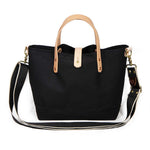 shoulder strap black waxed canvas mini tote with blonde leather handles