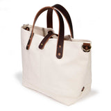 natural canvas mini tote with brown leather handles