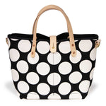 Bold black and white oversized dot print tote with blonde leather handles