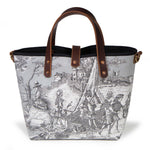 Back of the fog grey Seaside Toile Mini Tote, children gathered by a sailboat on the shore