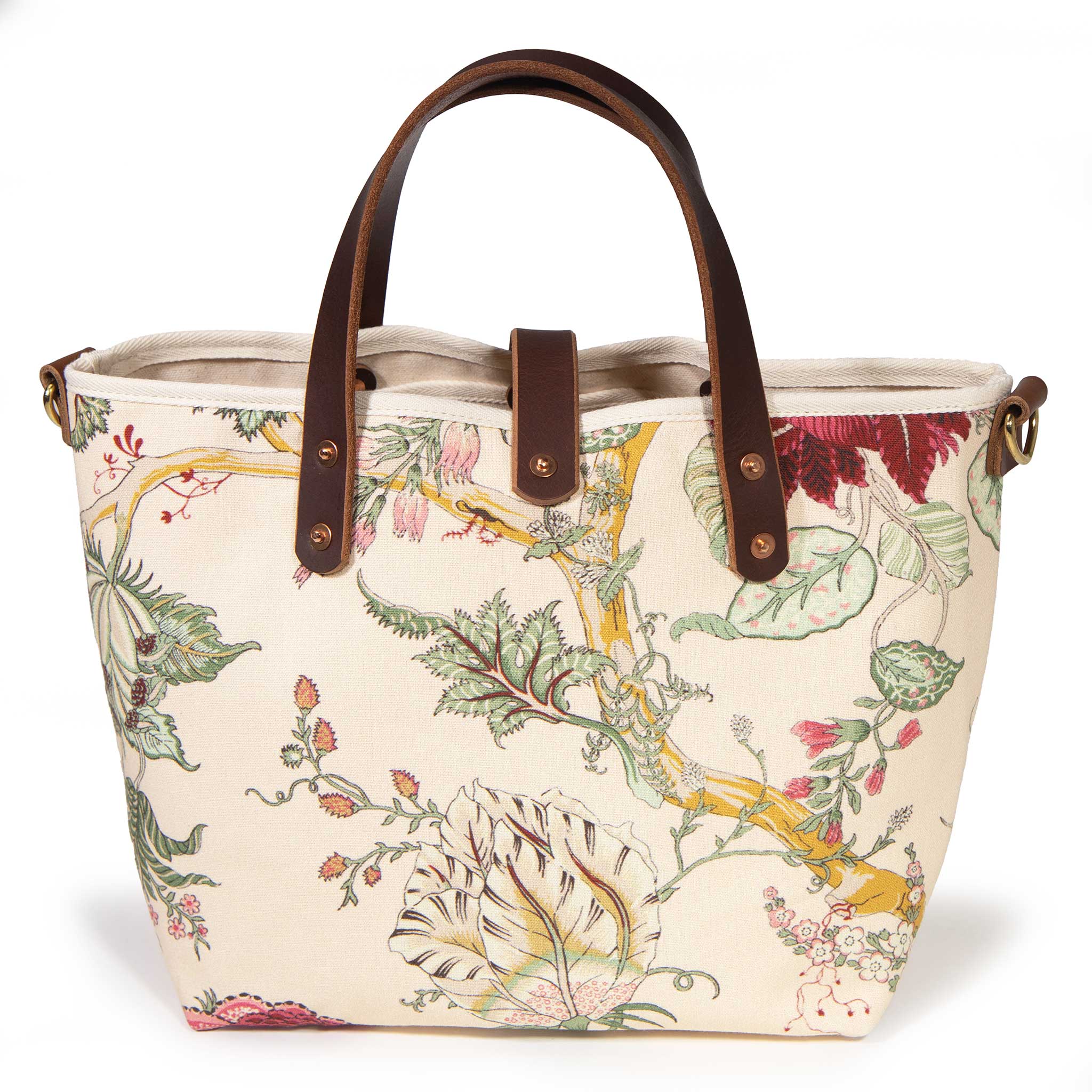 Back of the Botanique Floral Print Mini Tote, a large pale leaf and pink blossoms on cream