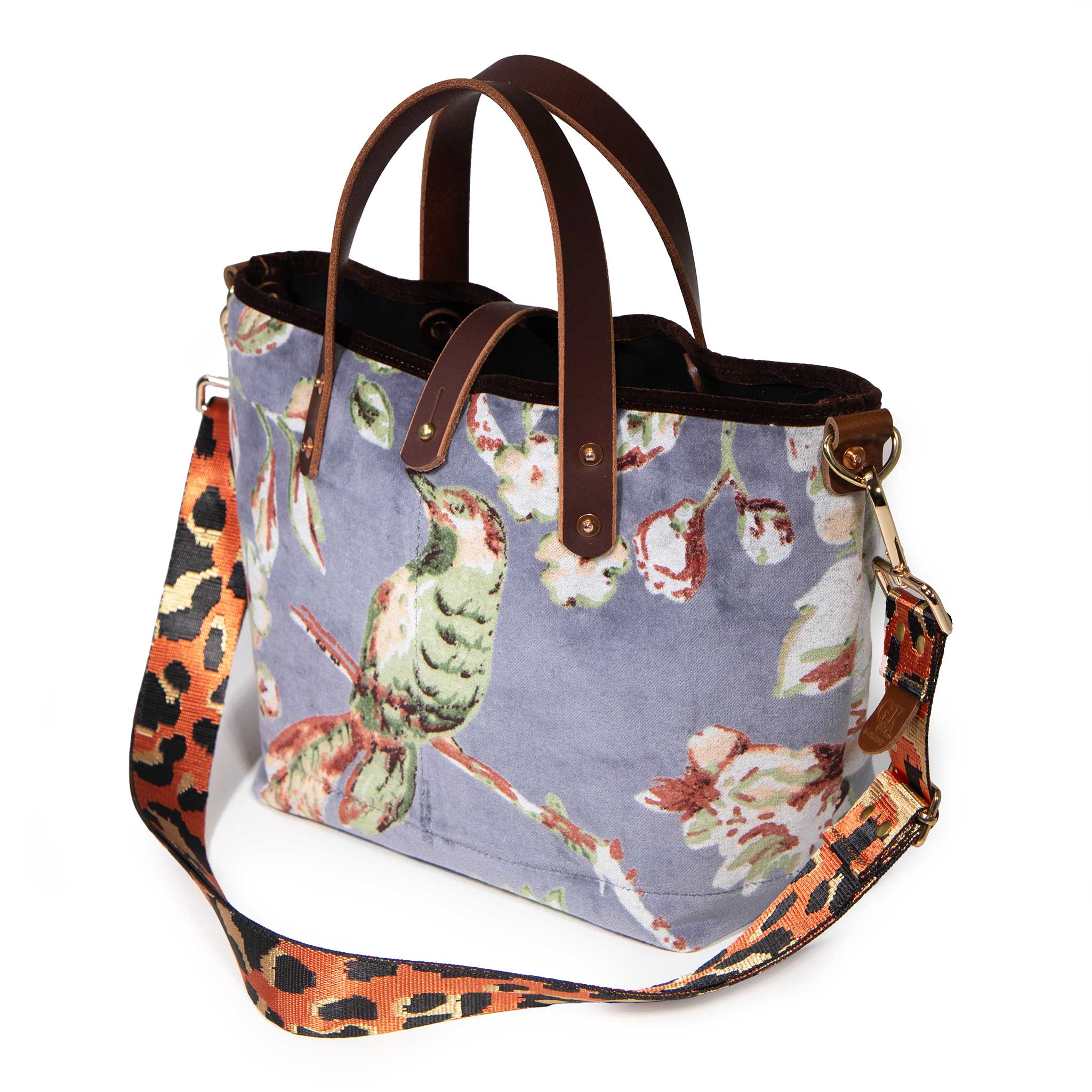 Aviary Luxe Velvet Mini Tote carried crossbody with a leopard print shoulder strap