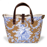 mini tote featuring oak and ink blue toile print with brown leather handles