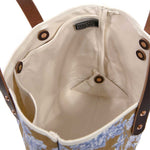 interior mini tote featuring oak and ink blue toile print with brown leather handles
