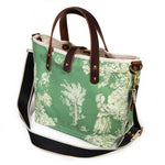 Shoulder strap green toile mini tote with brown leather handles