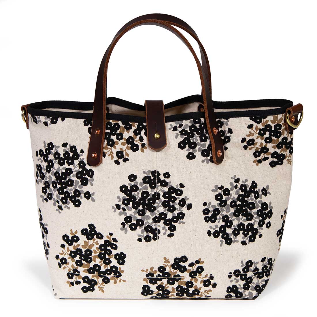 black and white floral mini tote with brown leather handles