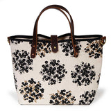 black and white floral mini tote with brown leather handles