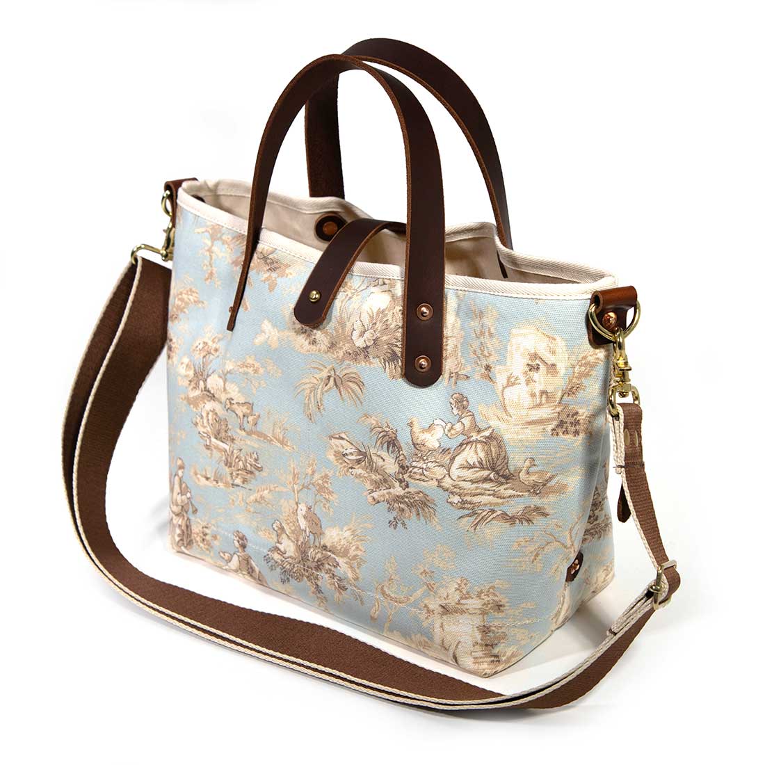 shoulder strap pale blue toile mini tote with brown leather handles