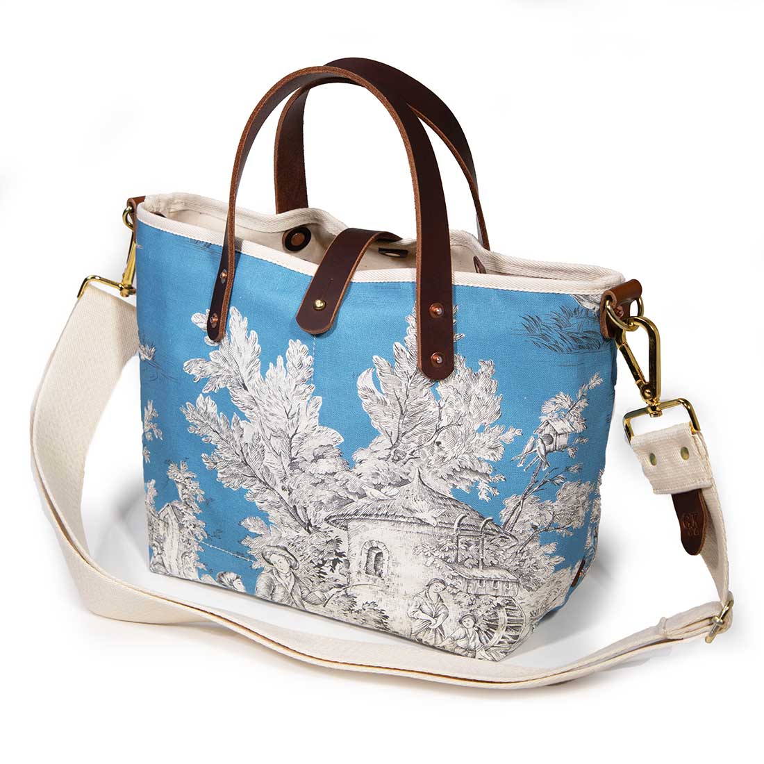 Shoulder strap blue toile mini tote with brown leather handles