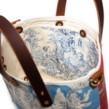 Interior red and light blue patchwork toile mini tote with brown leather handles