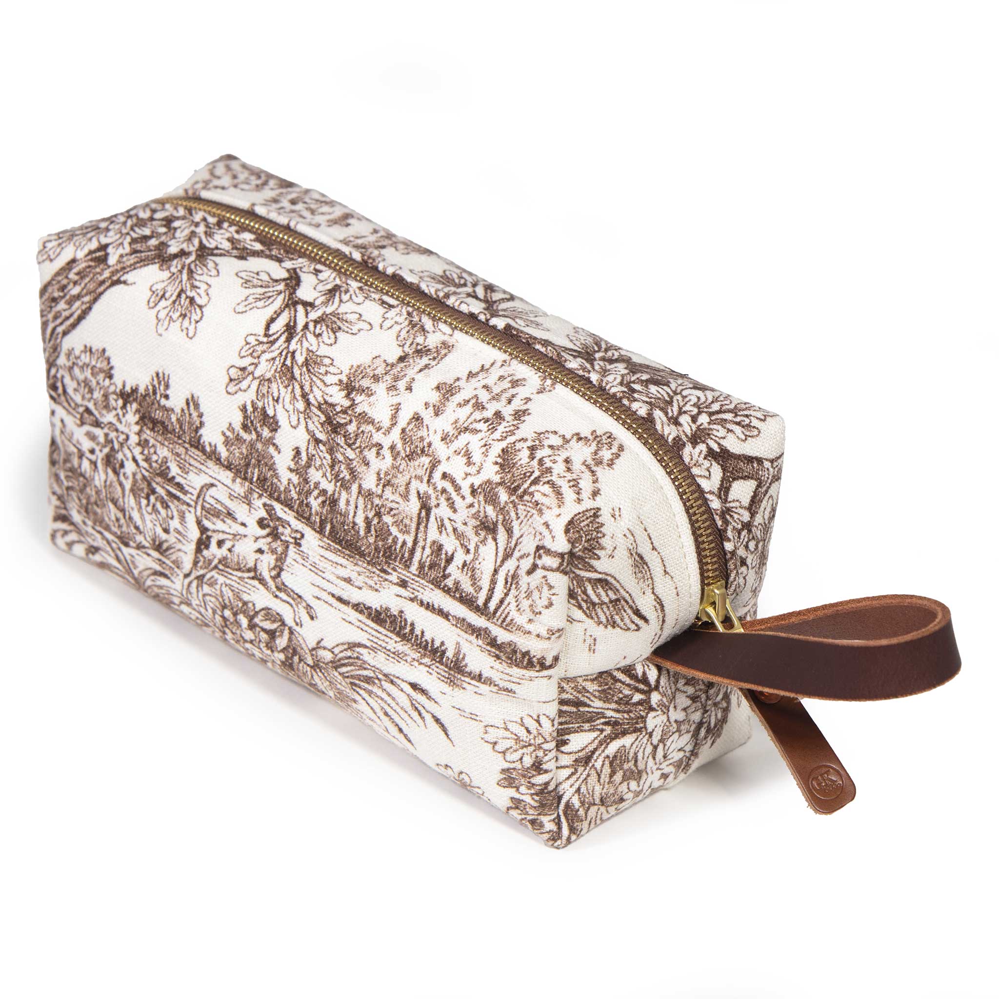 Horse Country Toile Travel Kit in brown-on-cream linen toile, three-quarter view with mahogany leather handle