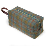 Oxford Wool Check Travel Kit seen from the handle end, green and blue wool check with rust accents