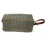 Front view of the Oxford Wool Check Travel Kit, a green and blue wool dopp kit with mahogany leather handle