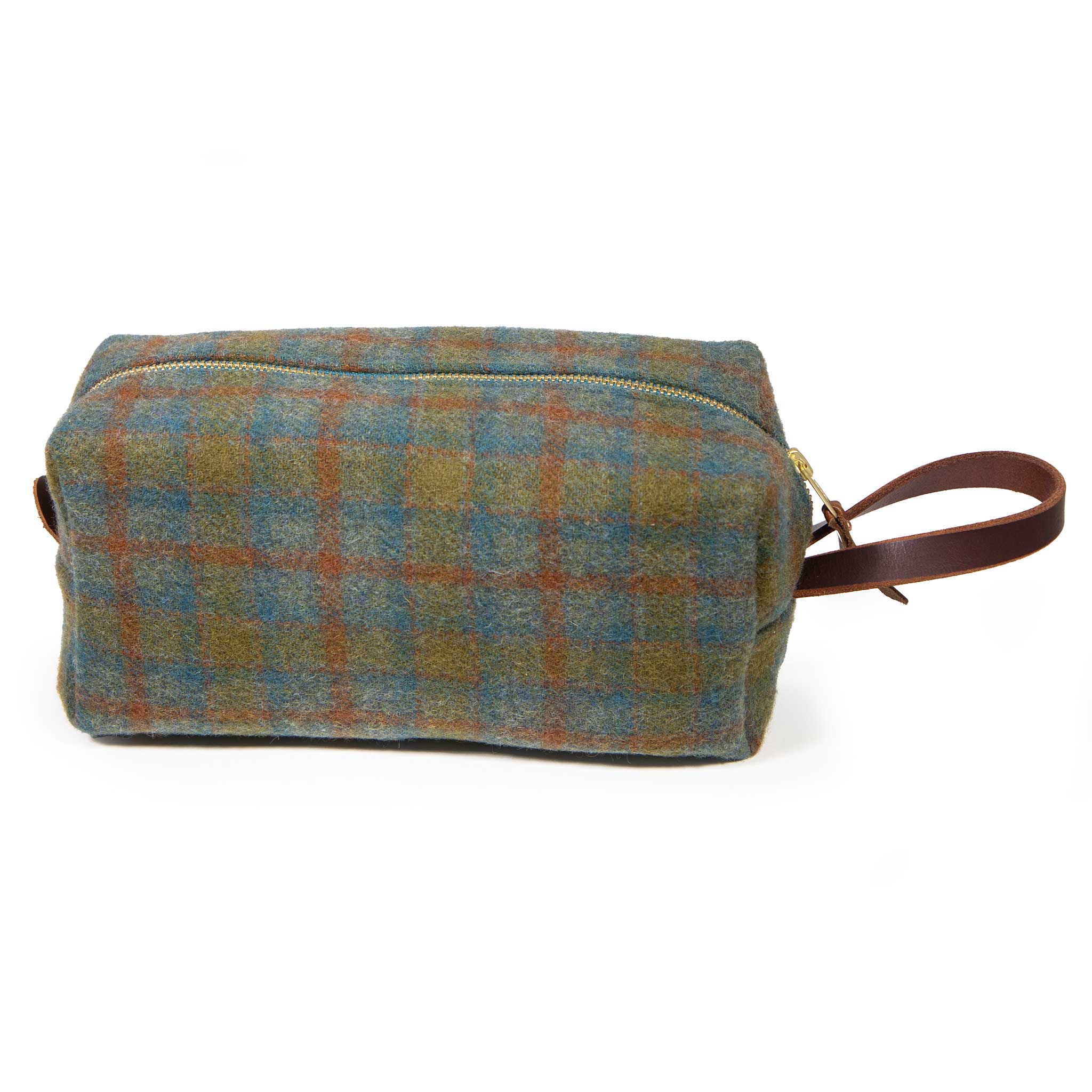 Front view of the Oxford Wool Check Travel Kit, a green and blue wool dopp kit with mahogany leather handle