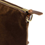 detail brown velvet clutch with brown leather d-ring holders