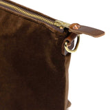 detail brown velvet clutch with brown leather d-ring holders