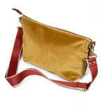 shoulder strap golden velvet clutch with brown leather d-ring holders