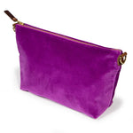 purple velvet clutch with brown leather d-ring holders