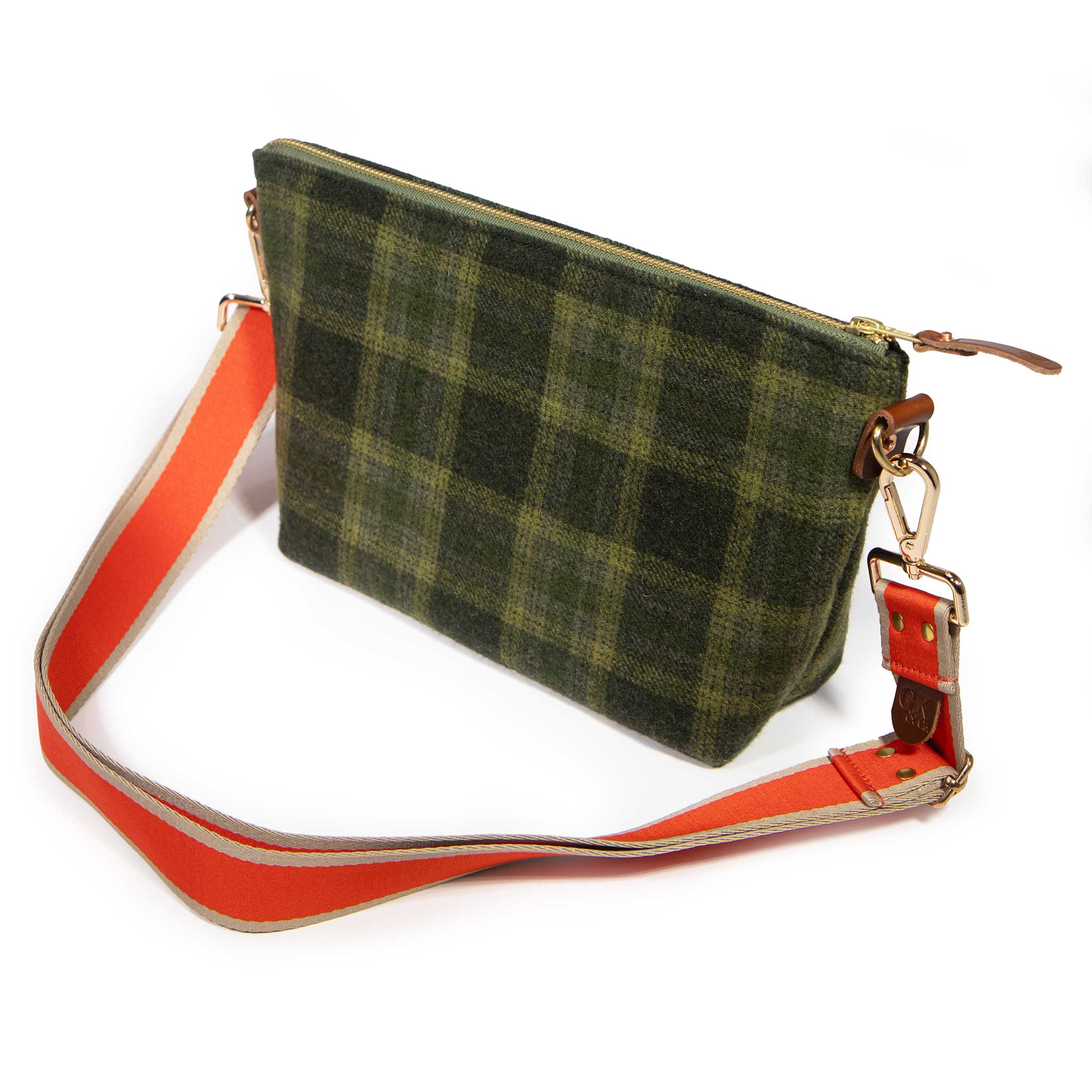 Everyday Wool Clutch in Moss Check worn with an orange and cream woven shoulder strap, sold separately