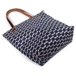 Japanese navy canvas portfolio tote with dragonfly print and brown leather handles and zipper