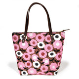 Soft pink floral tote with vintage midcentury-inspired print and brown leather handles