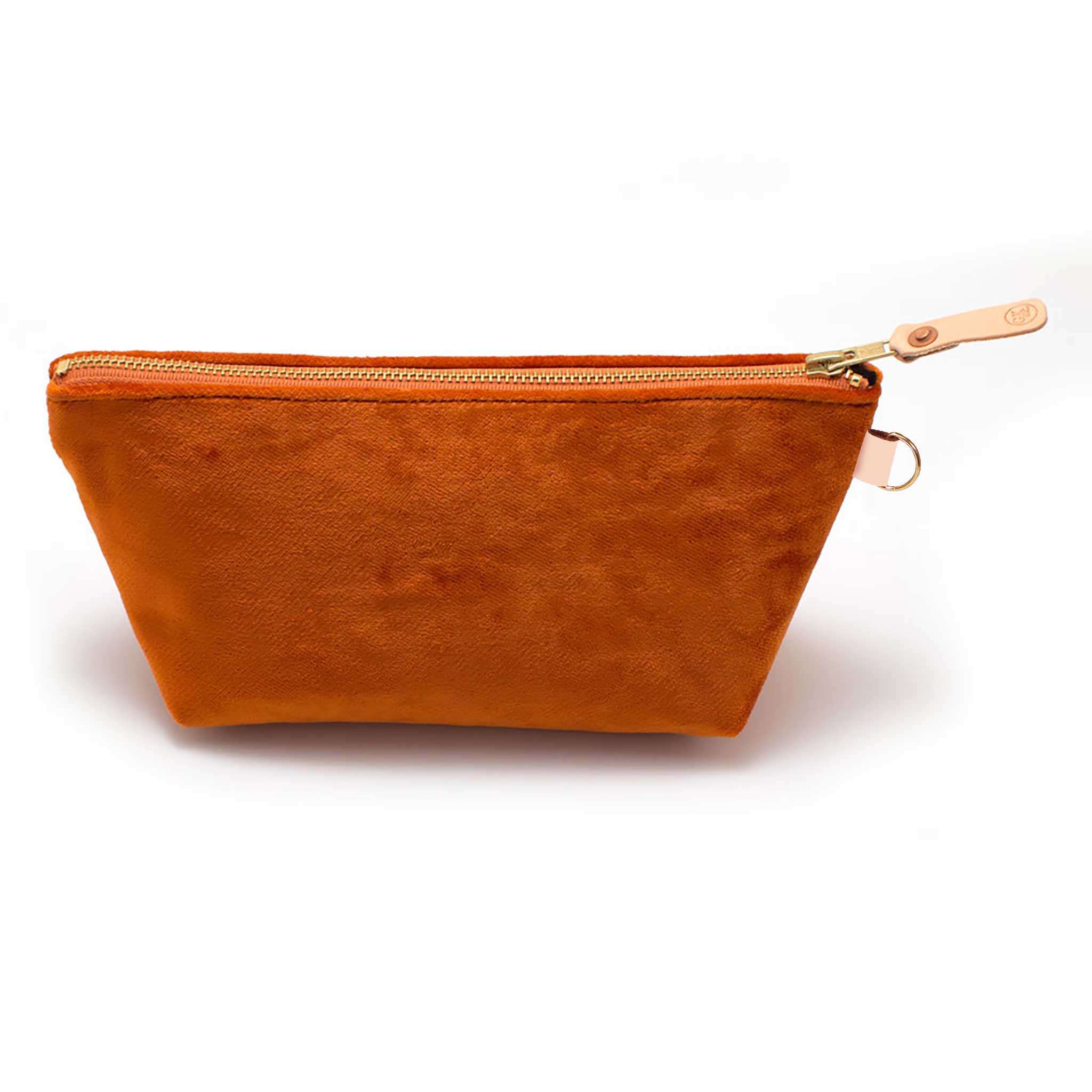 Front of the Carrot Velvet Travel Clutch, carrot orange velvet, with brass zipper and blonde leather pull