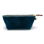 Front of the Ocean Velvet Travel Clutch, ocean teal velvet, with brass zipper and mahogany leather pull