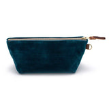 Front of the Ocean Velvet Travel Clutch, ocean teal velvet, with brass zipper and mahogany leather pull