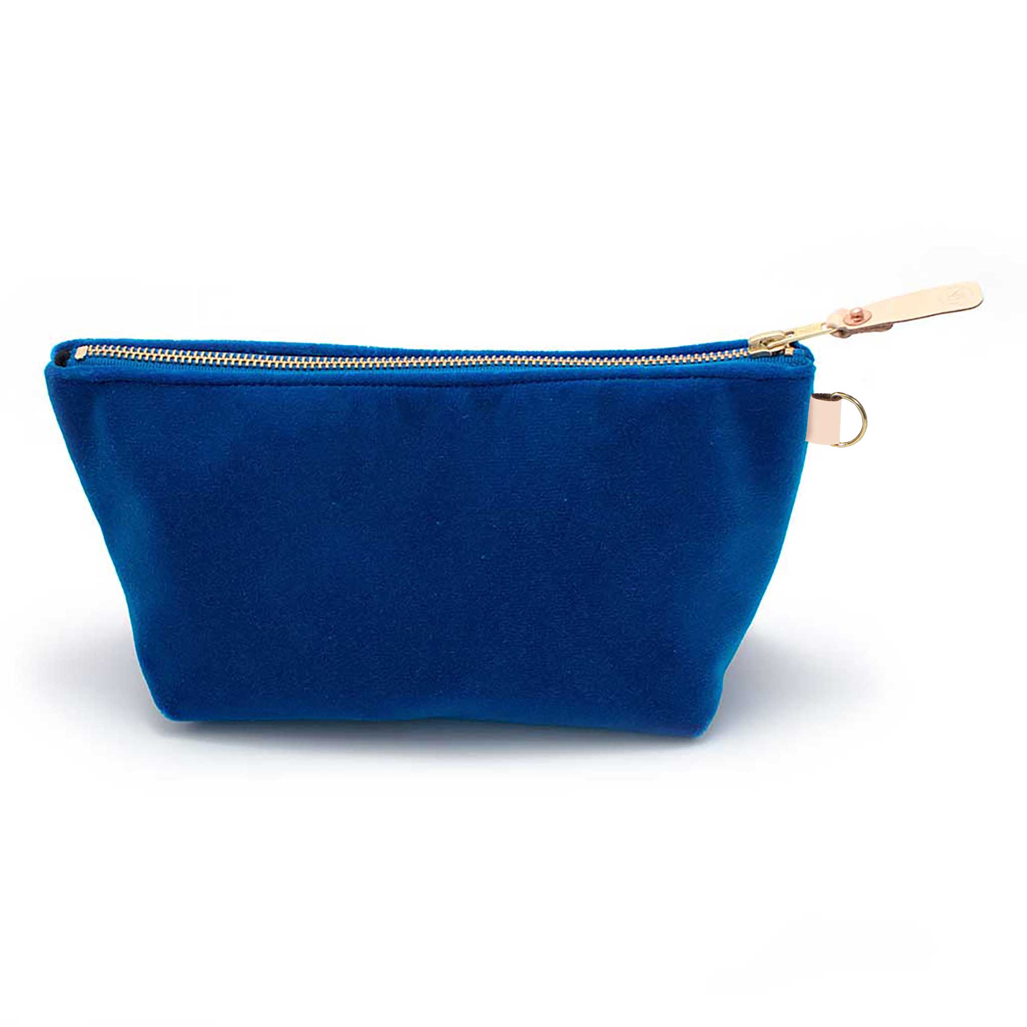 Front of the Sapphire Velvet Travel Clutch, sapphire blue velvet, with brass zipper and blonde leather pull