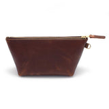 Front of the Mahogany Leather Travel Clutch, brown leather, with brass zipper and mahogany leather pull
