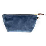 Front of the Wedgewood Blue Velvet Travel Clutch, Wedgewood blue velvet, with brass zipper and mahogany leather pull