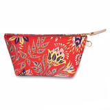 Front of the French Country Floral Travel Clutch, blue and yellow blooms on red, with brass zipper and blonde leather pull