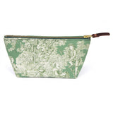 Front of the Emerald Toile Travel Clutch, cream toile scenes on emerald green, with brass zipper and mahogany leather pull